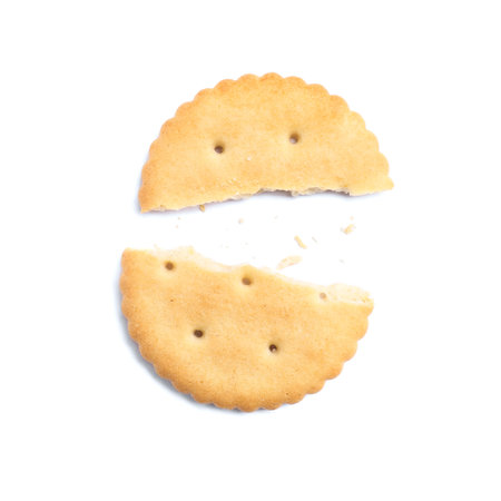 Crispy broken cracker isolated on white, top viewの写真素材