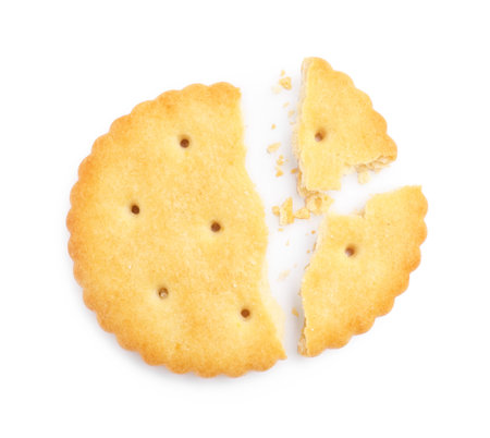 Crispy broken cracker isolated on white, top viewの写真素材