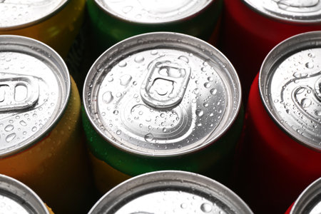 Energy drinks in wet cans, closeup. Functional beverageの写真素材