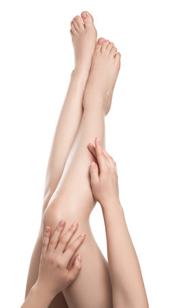 Woman with beautiful legs isolated on white, closeupの写真素材