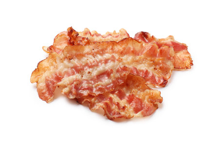 Delicious fried bacon slices isolated on whiteの写真素材