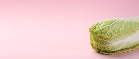 Fresh ripe Chinese cabbage on pink background, space for text. Banner designの写真素材