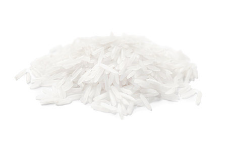 Pile of raw basmati rice isolated on whiteの写真素材