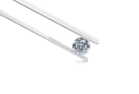 Tweezers with beautiful shiny diamond isolated on white