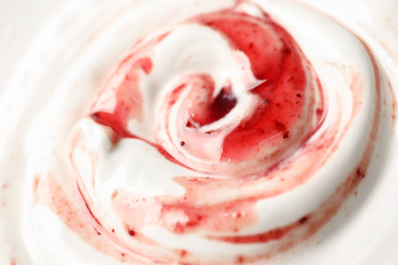 Tasty yoghurt with jam as background, closeup