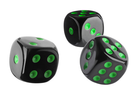 Three black dice in air on white backgroundの写真素材