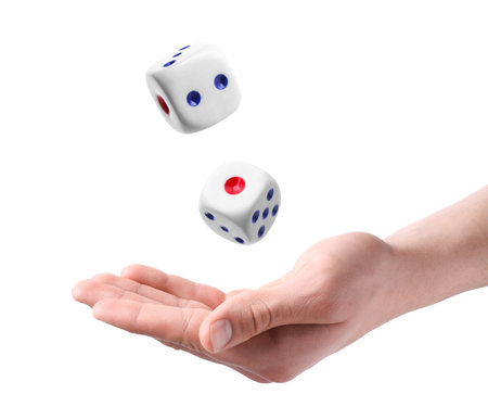 Man throwing dice on white background, closeupの写真素材