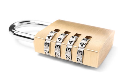 Locked steel combination padlock isolated on whiteの写真素材