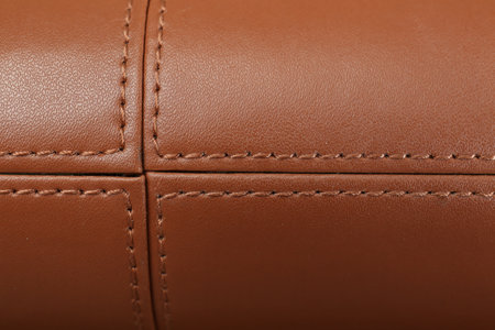 Texture of brown leather as background, top viewの写真素材