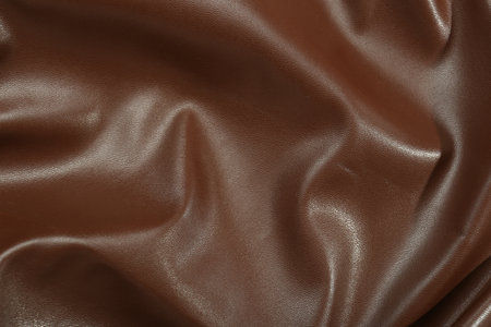 Brown natural leather as background, top viewの写真素材