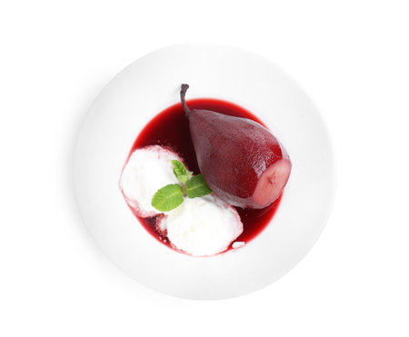 Tasty red wine poached pear with mint 'and ice cream isolated on white, top viewの写真素材