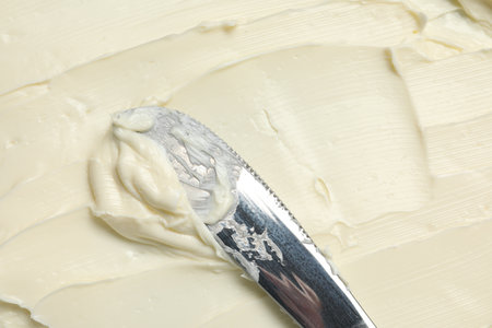Closeup view of tasty butter and knife