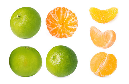 Fresh ripe tangerines with green peel isolated on white, setの写真素材