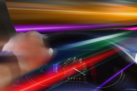 Man driving car, closeup. Motion blur, speed movement effectの写真素材