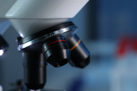 One microscope on blurred background, closeup view