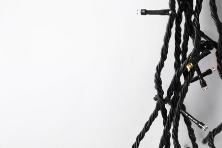 Beautiful Christmas lights on white background, top viewの写真素材