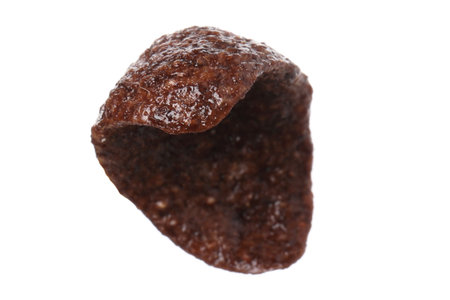 Breakfast cereal. Chocolate corn flake isolated on whiteの写真素材