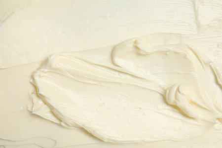 Texture of tasty butter as background, top viewの写真素材