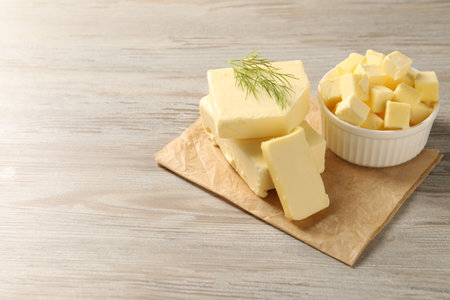 Tasty butter with dill on wooden table. Space for textの写真素材