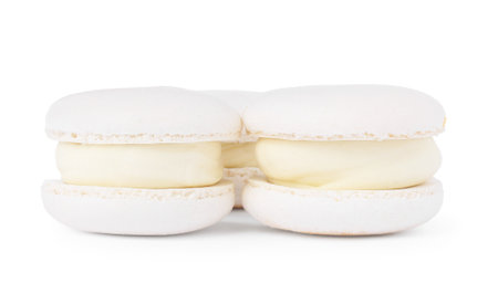 Three delicious sweet macarons isolated on whiteの写真素材