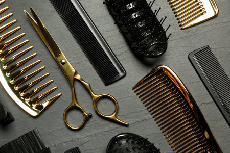Hairdressing tools on gray textured background, flat layの写真素材