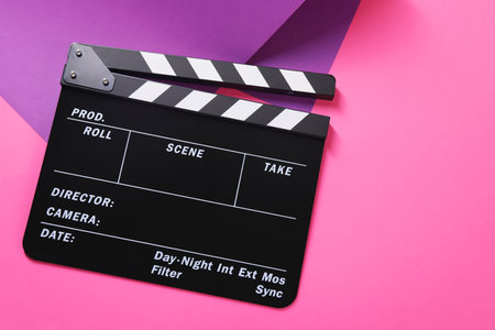 Clapperboard on color background, top view. Space for textの写真素材