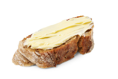 Slice of tasty bread with butter isolated on white