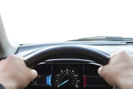 Man driving car with speedometer on dashboard, closeupの写真素材