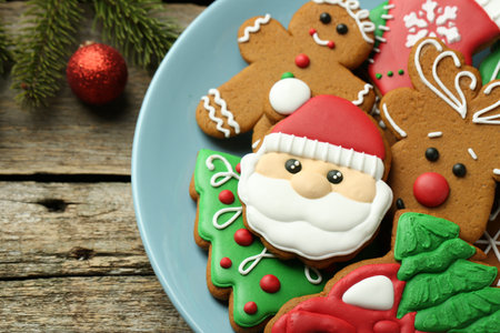 Different tasty Christmas cookies on wooden table, above view. Space for textの写真素材