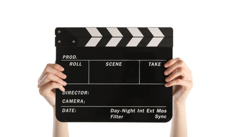 Woman holding movie clapper on white background, closeupの写真素材