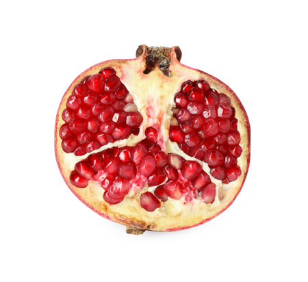 Half of fresh pomegranate isolated on whiteの写真素材