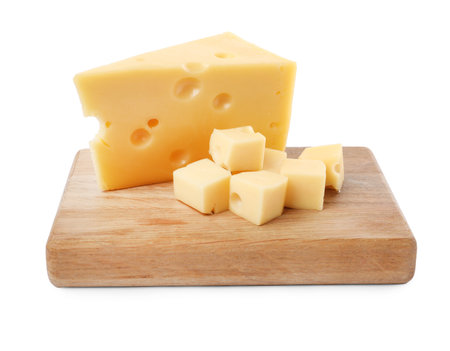 Cut fresh delicious cheese isolated on whiteの写真素材