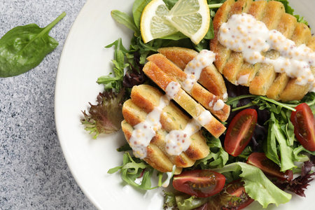 Healthy dish high in vegetable fats on light textured table, top view