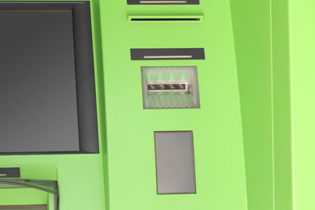 Modern automated cash machine with screen outdoorsの写真素材