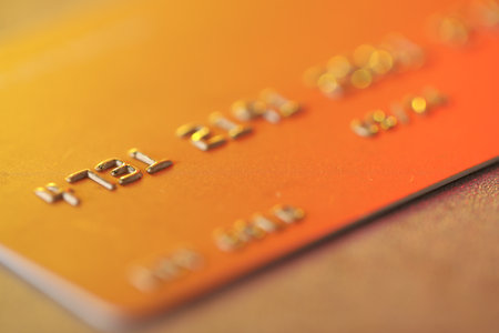 Plastic credit card on table, macro viewの写真素材