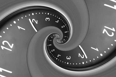 Infinity and other time related concepts. Black clock face twisted in spiral, fractal patternの写真素材