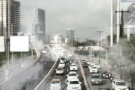 Environmental pollution. Air contaminated with fumes in city. Cars surrounded by exhausted on road,...