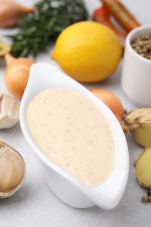 Fresh marinade and different ingredients on light gray table, closeupの写真素材