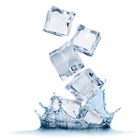 Ice cubes falling into water on white backgroundの写真素材