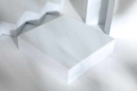 Presentation of product. Podium on white background, space for text