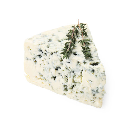 Tasty blue cheese with thyme isolated on whiteの写真素材