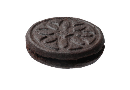 One tasty sandwich cookie isolated on whiteの写真素材