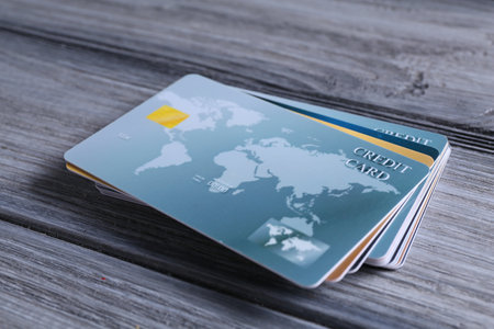 Credit cards on grey wooden table, closeupの写真素材