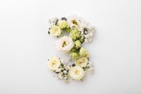 Number 3 made of beautiful flowers on white background, top viewの写真素材