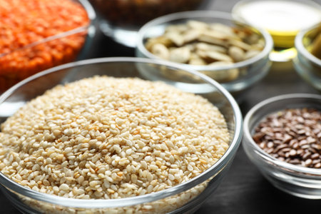 Sesame seeds in bowl on table, closeup. Healthy fatsの写真素材