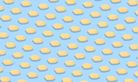 Pattern of peeled peanuts on light blue background