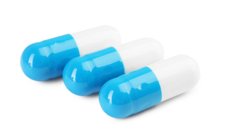 Antibiotic pills isolated on white. Medical treatment