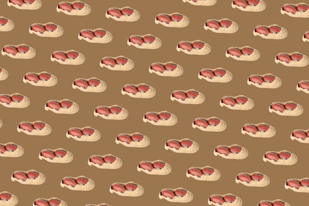 Pattern of unpeeled peanuts on brown background