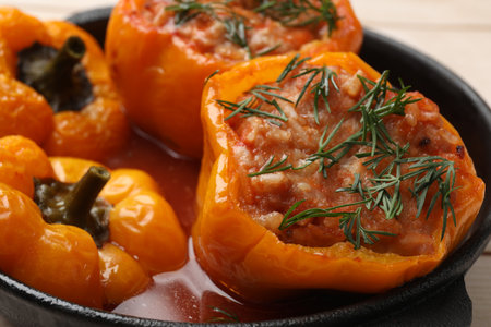 Tasty stuffed peppers in pan on table, closeupの写真素材