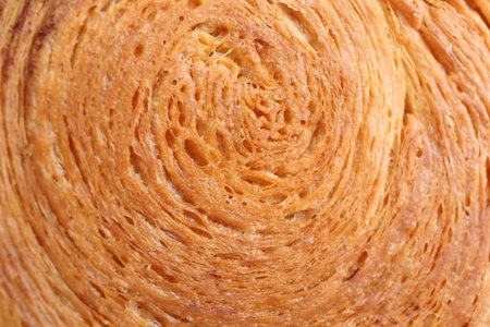 Tasty puff pastry. Supreme croissant as background, closeup